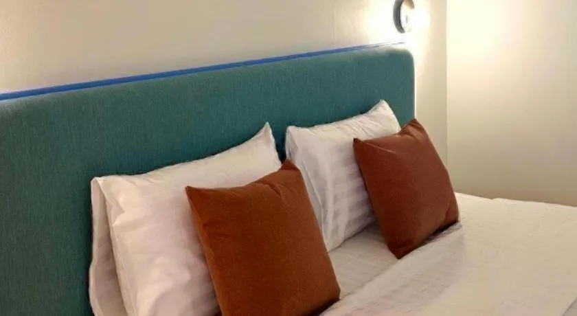 Bed in 777Bliss Hometel