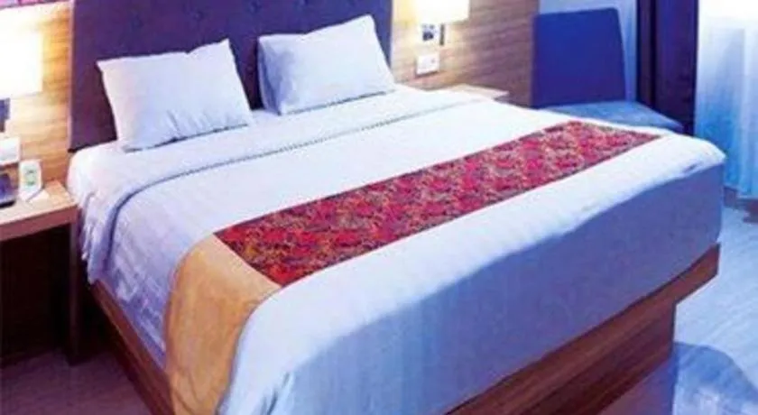 Bed in Orchardz Hotel Gajah Mada