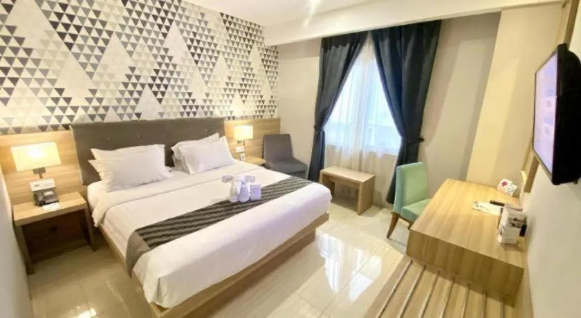 Bed in Orchardz Hotel Gajah Mada