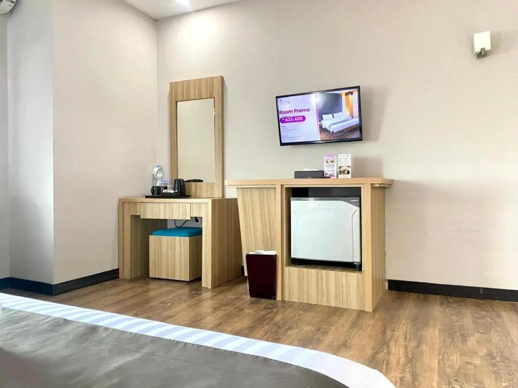 Bed in Orchardz Hotel Gajah Mada