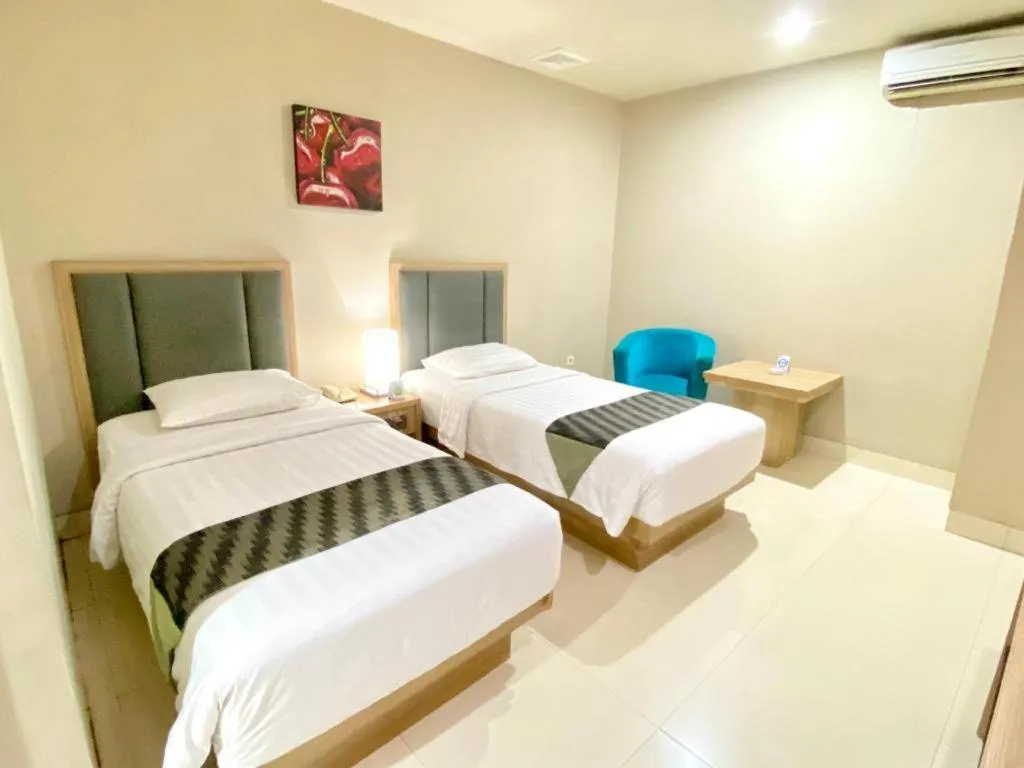 Bed in Orchardz Hotel Gajah Mada