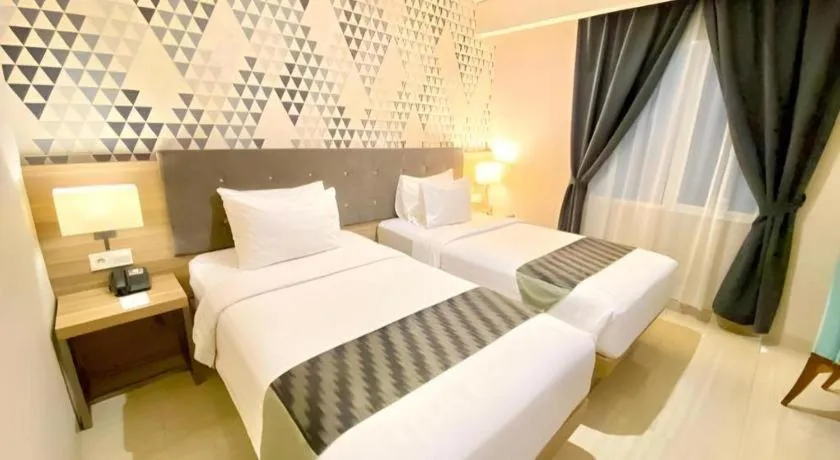Bed in Orchardz Hotel Gajah Mada