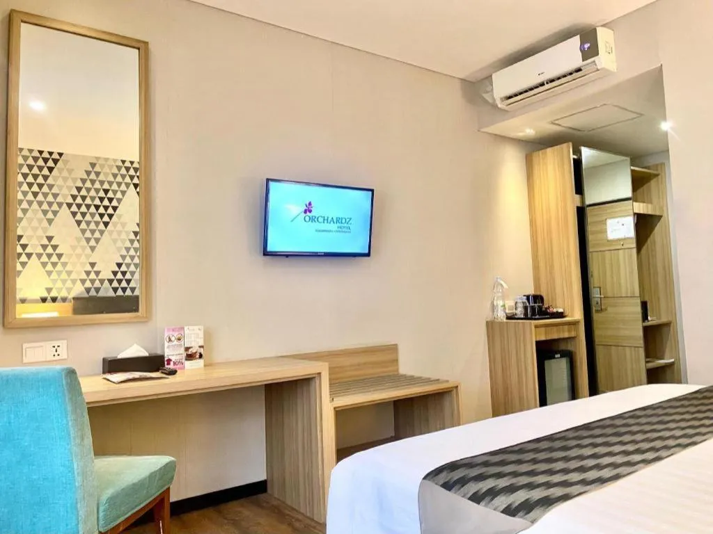 Bed in Orchardz Hotel Gajah Mada