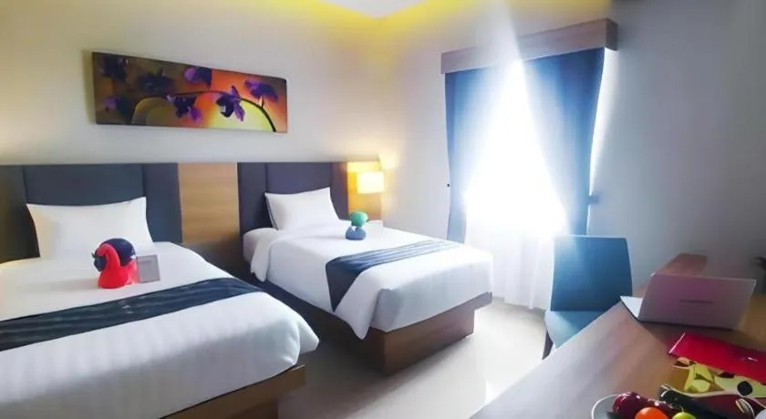 Bed in Orchardz Hotel Gajah Mada