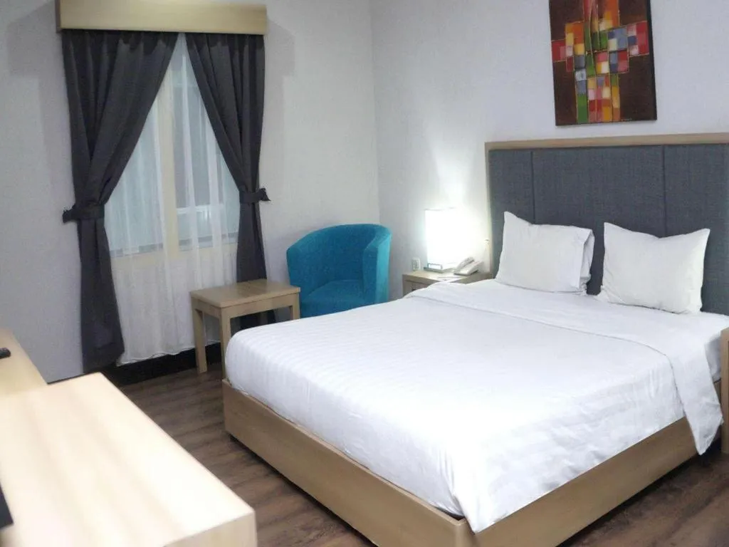 Bed in Orchardz Hotel Gajah Mada