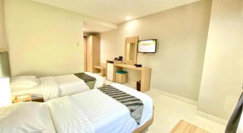 Bed in Orchardz Hotel Gajah Mada