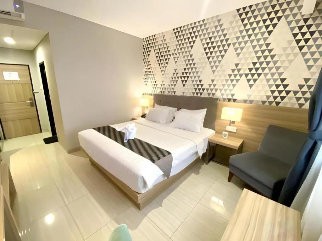 Bed in Orchardz Hotel Gajah Mada