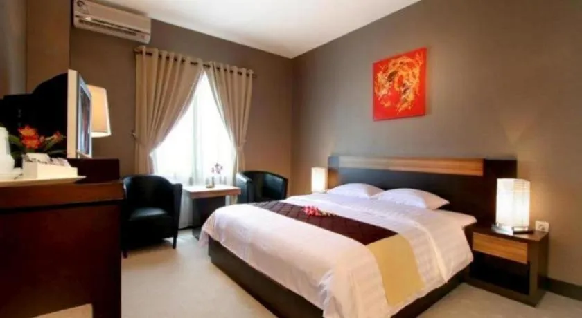 Bed in Orchardz Hotel Gajah Mada