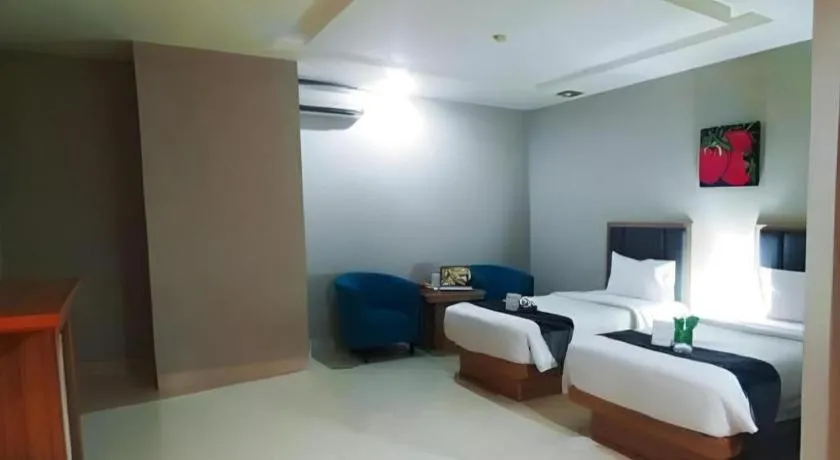 Bed in Orchardz Hotel Gajah Mada