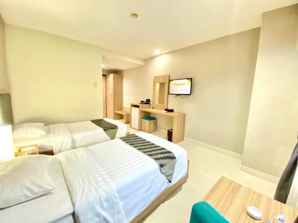 Bed in Orchardz Hotel Gajah Mada