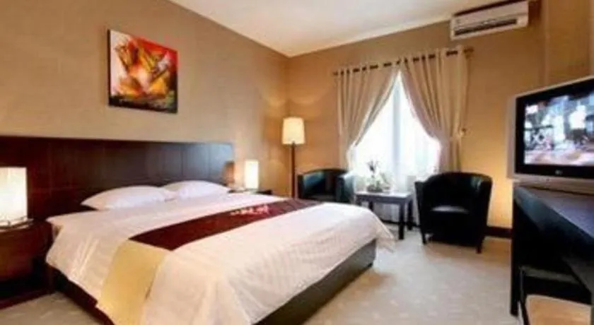 Bed in Orchardz Hotel Gajah Mada