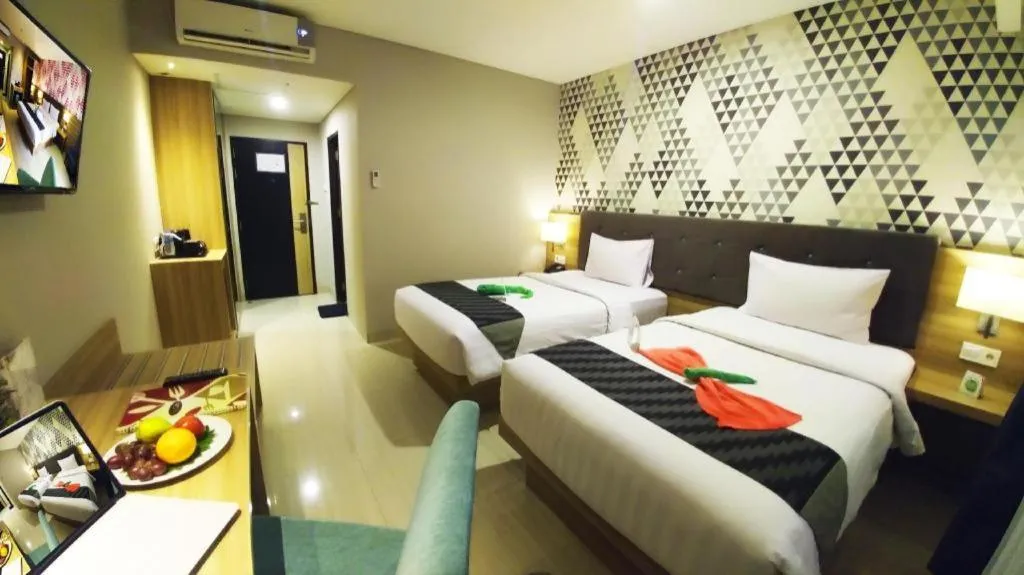 Bed in Orchardz Hotel Gajah Mada