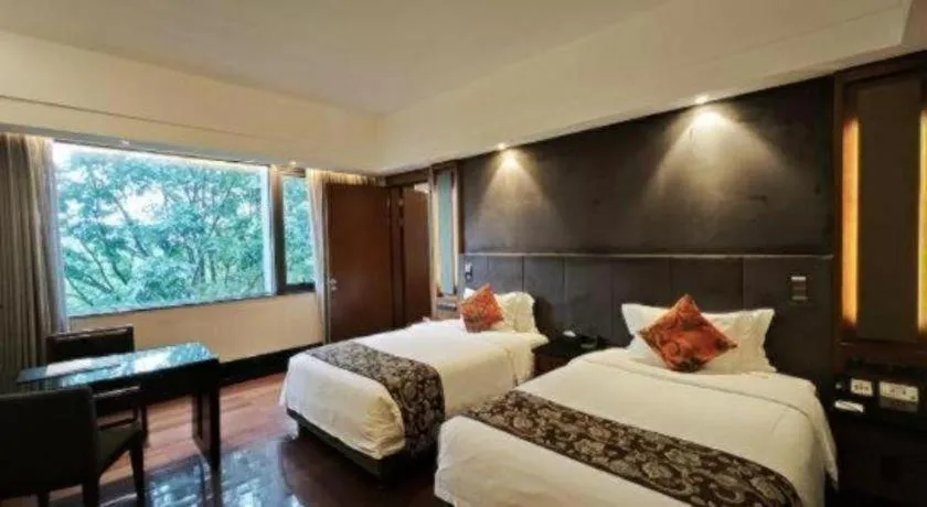 Bed in Worldhotel Grand Dushulake Suzhou