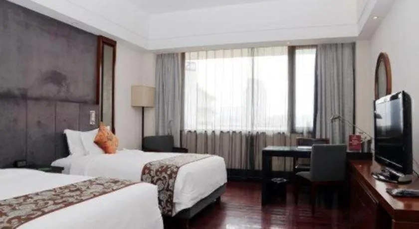 Bed in Worldhotel Grand Dushulake Suzhou