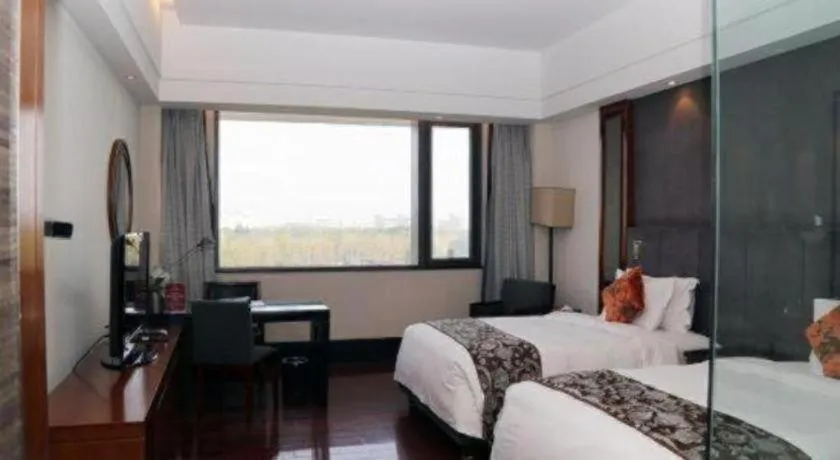 Bed in Worldhotel Grand Dushulake Suzhou