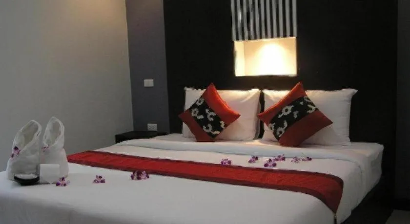 Bed in The Impress Khonkaen Hotel