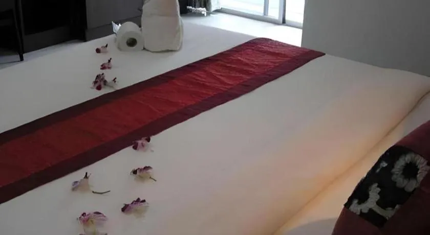 Bed in The Impress Khonkaen Hotel