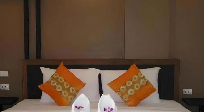 Bed in The Impress Khonkaen Hotel