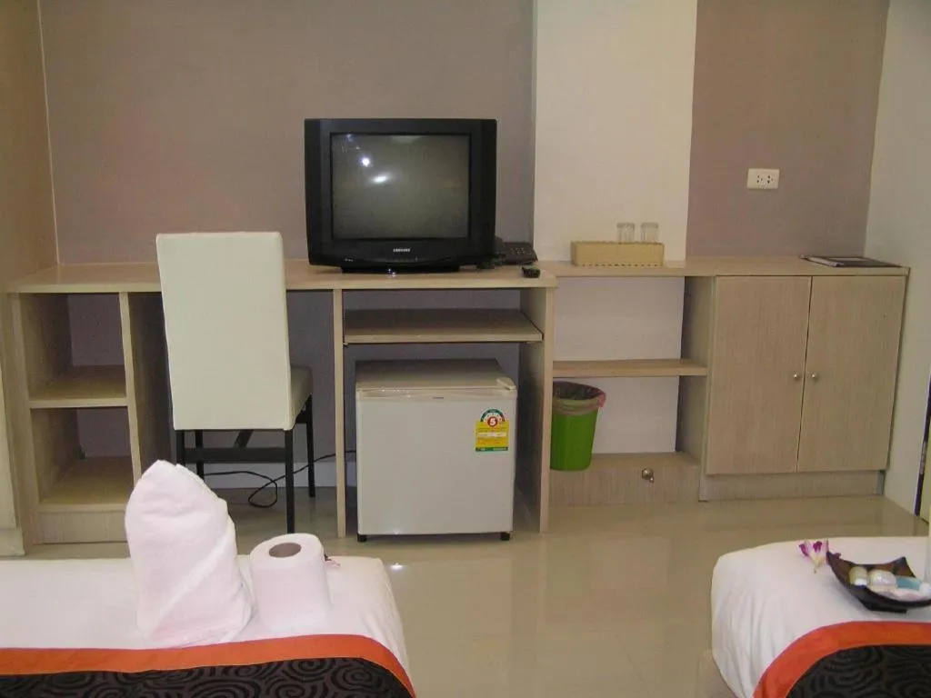 Bed in The Impress Khonkaen Hotel