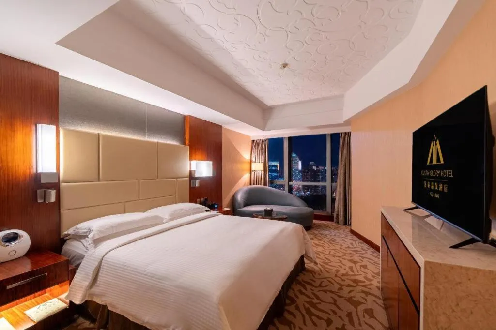 Bed in Kun Tai Glory Hotel Beijing Wangjing