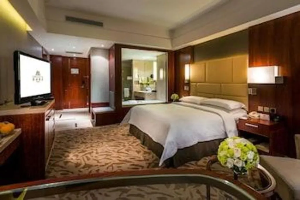 Bed in Kun Tai Glory Hotel Beijing Wangjing