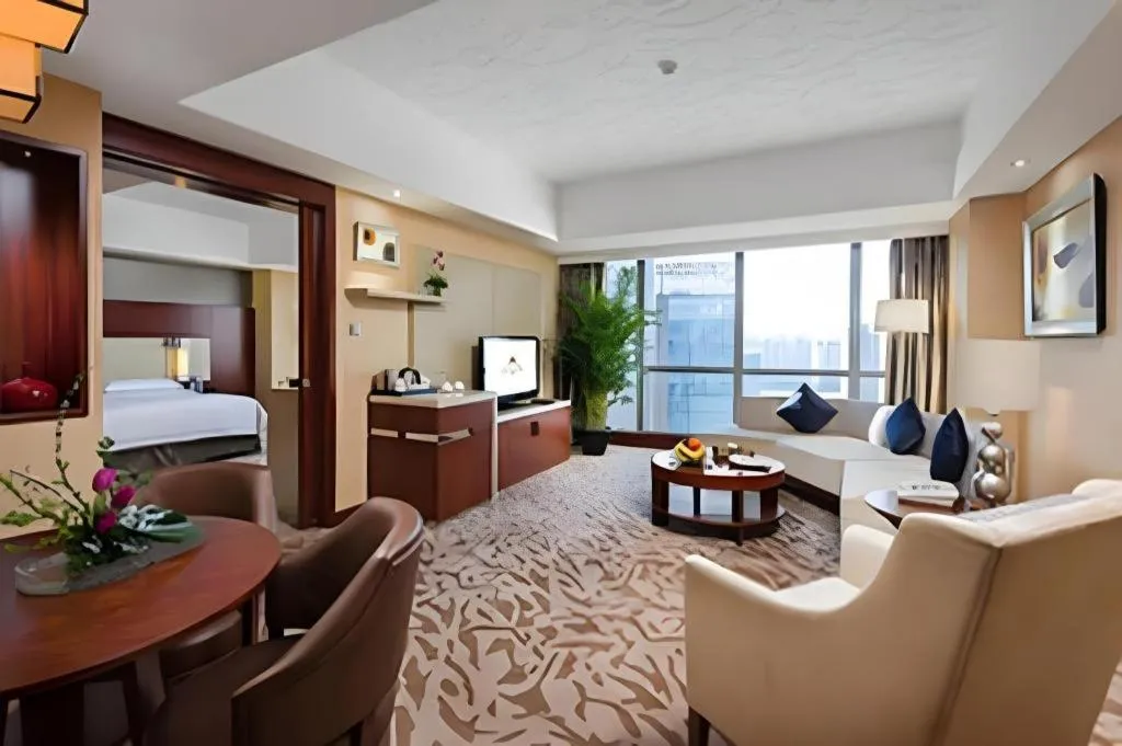 Bed in Kun Tai Glory Hotel Beijing Wangjing