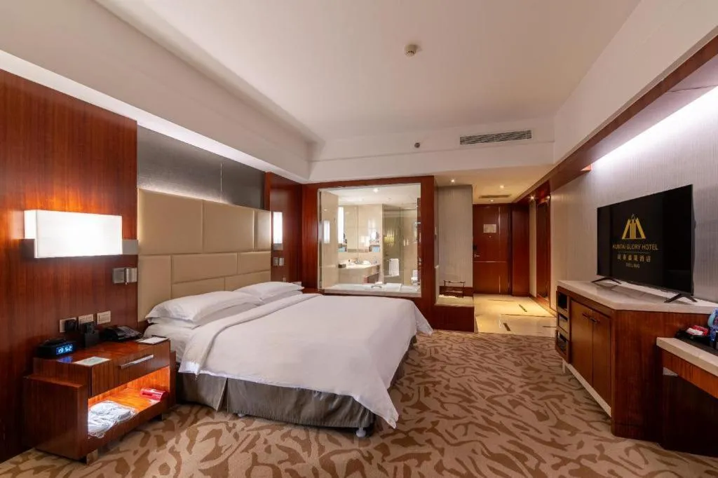 Bed in Kun Tai Glory Hotel Beijing Wangjing