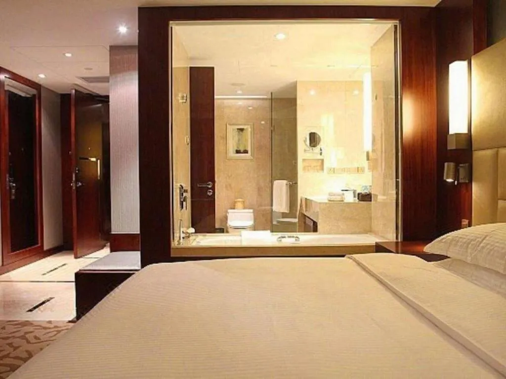 Bed in Kun Tai Glory Hotel Beijing Wangjing