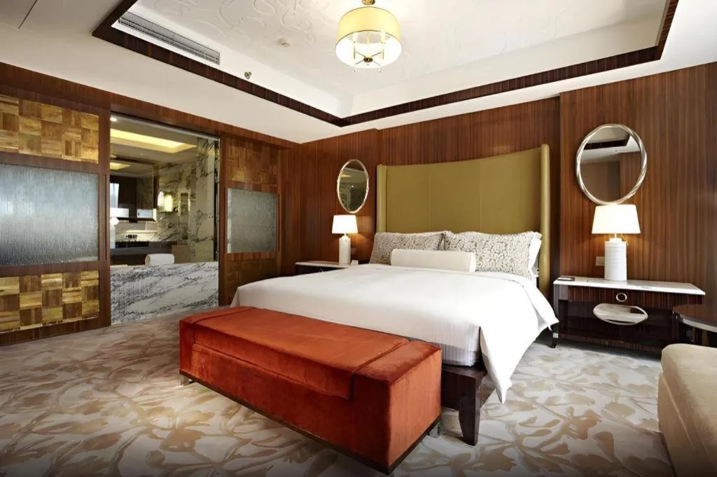 Bed in Kun Tai Glory Hotel Beijing Wangjing