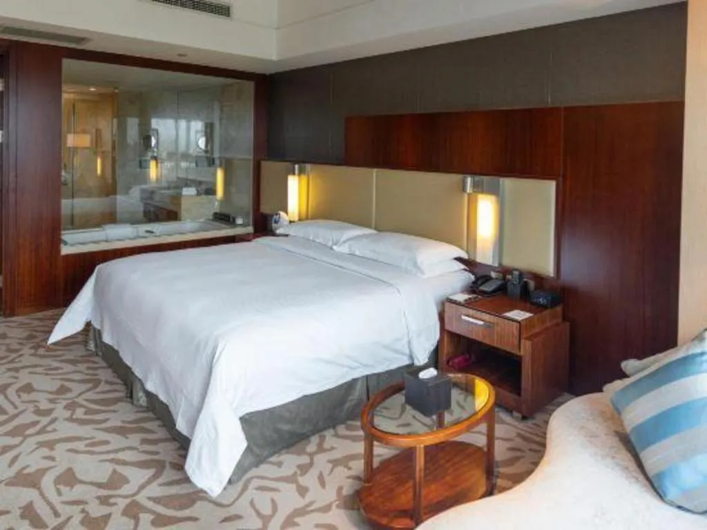 Bed in Kun Tai Glory Hotel Beijing Wangjing