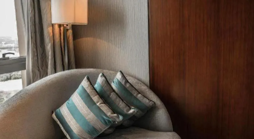 Bed in Kun Tai Glory Hotel Beijing Wangjing