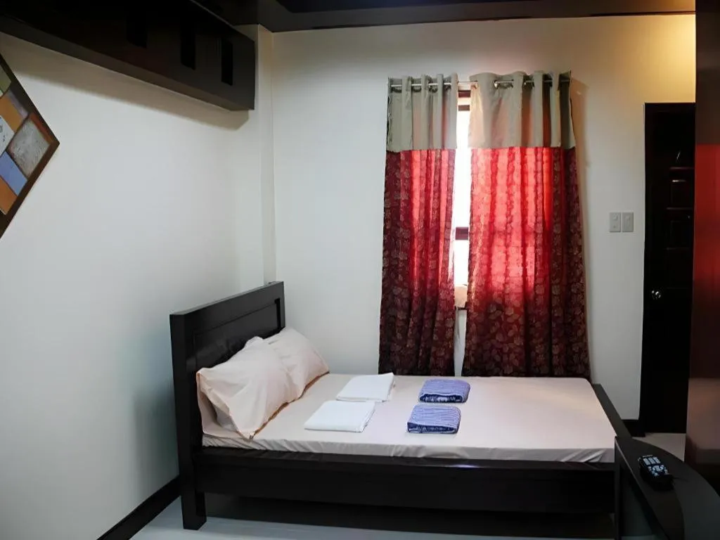 Bed in Costa Villa Beach Resort