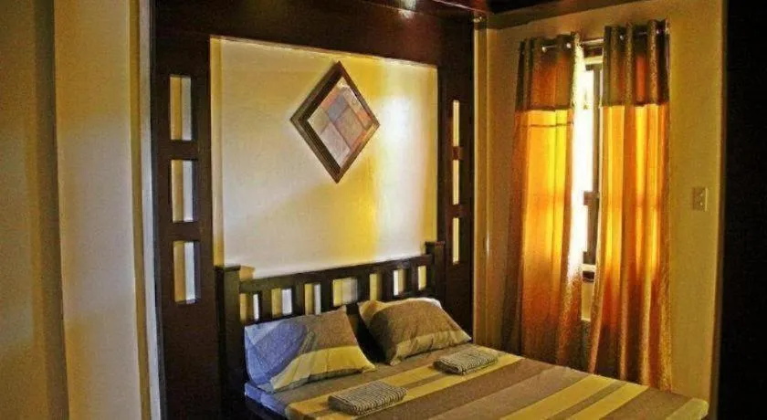 Bed in Costa Villa Beach Resort