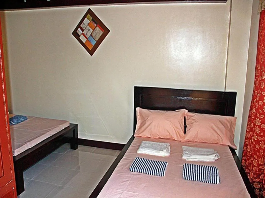 Bed in Costa Villa Beach Resort