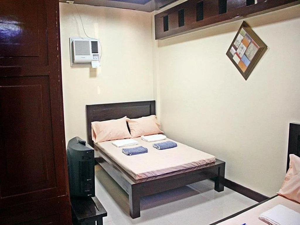 Bed in Costa Villa Beach Resort