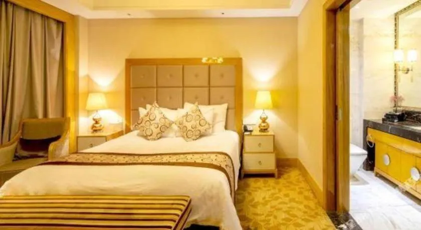 Bed in New Century Grand Hotel Xinxiang