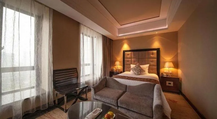 Bed in New Century Grand Hotel Xinxiang