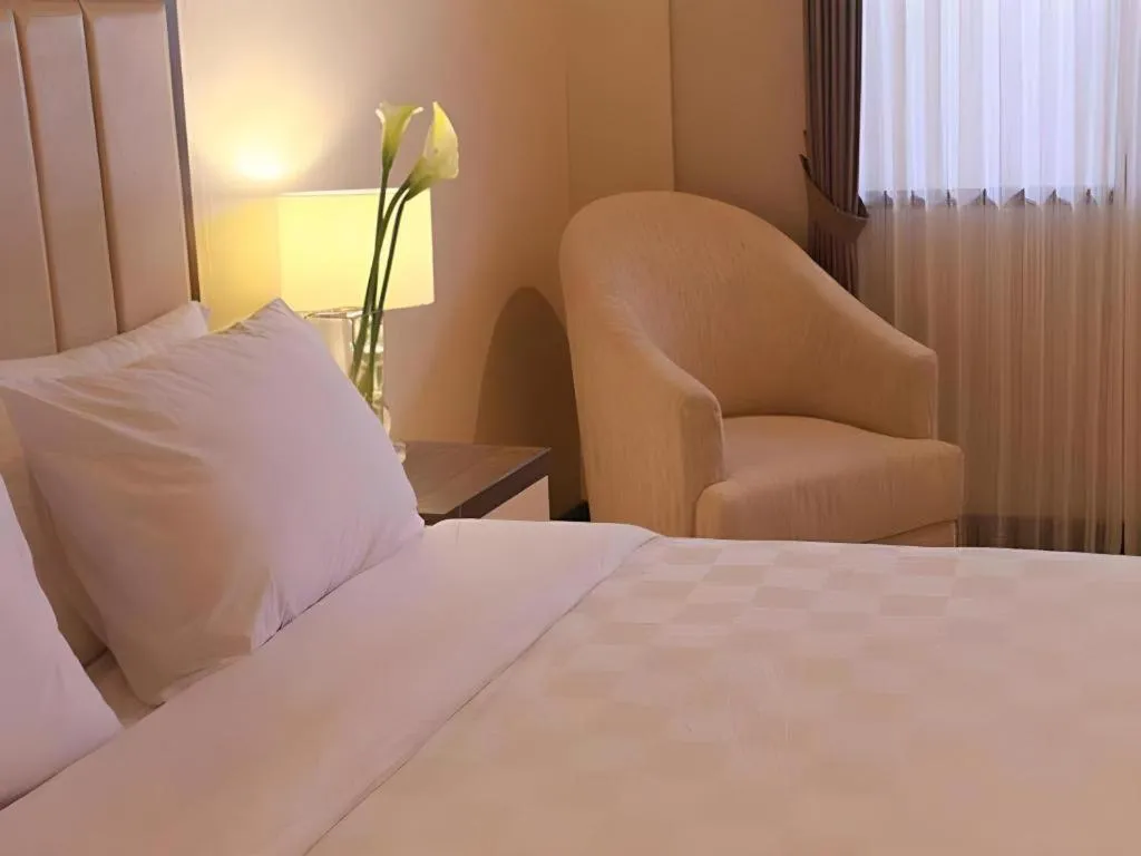 Bed in Bella Hotel Surabaya
