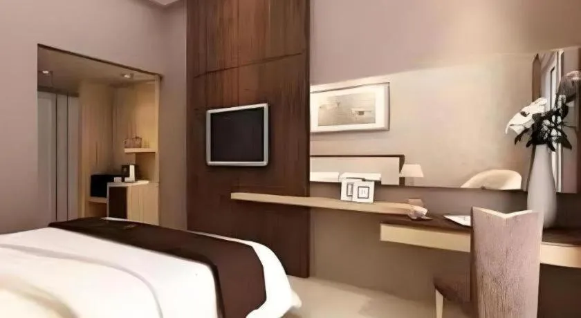 Bed in Bella Hotel Surabaya