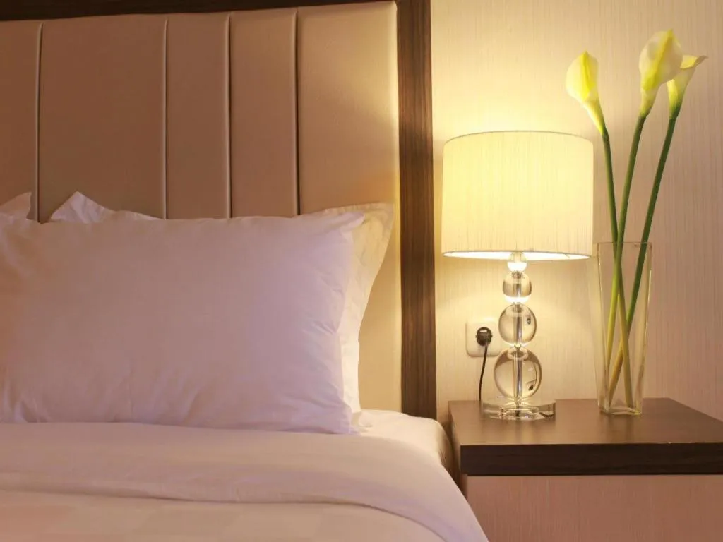 Bed in Bella Hotel Surabaya