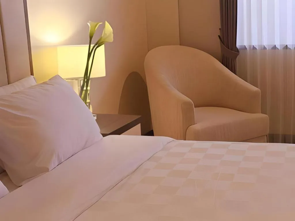 Bed in Bella Hotel Surabaya