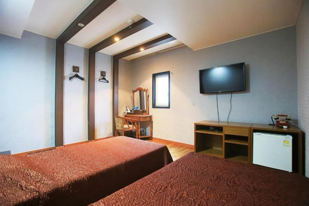 Bed in Monaco Hotel Jeju