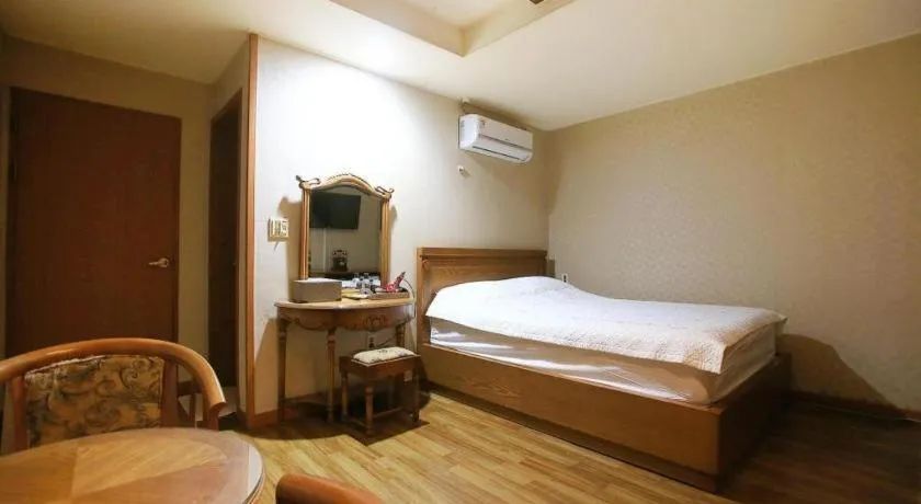 Bed in Monaco Hotel Jeju