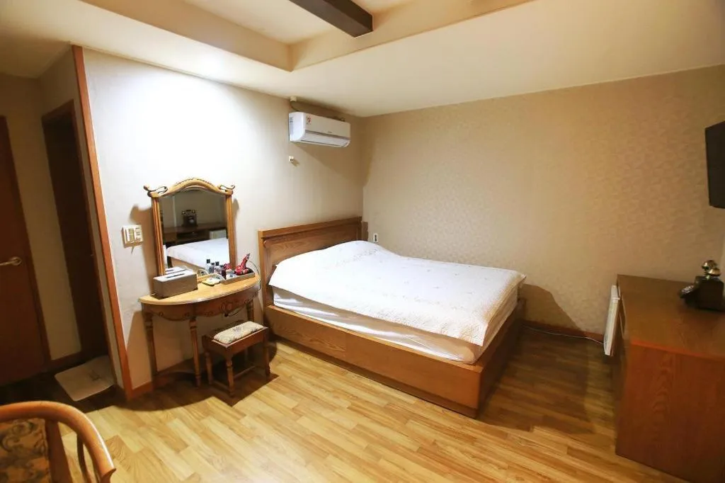 Bed in Monaco Hotel Jeju