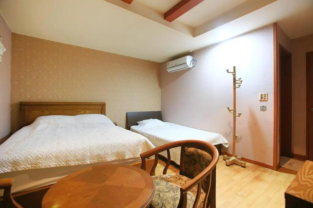 Bed in Monaco Hotel Jeju