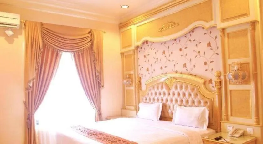 Bed in Hotel Grand Town