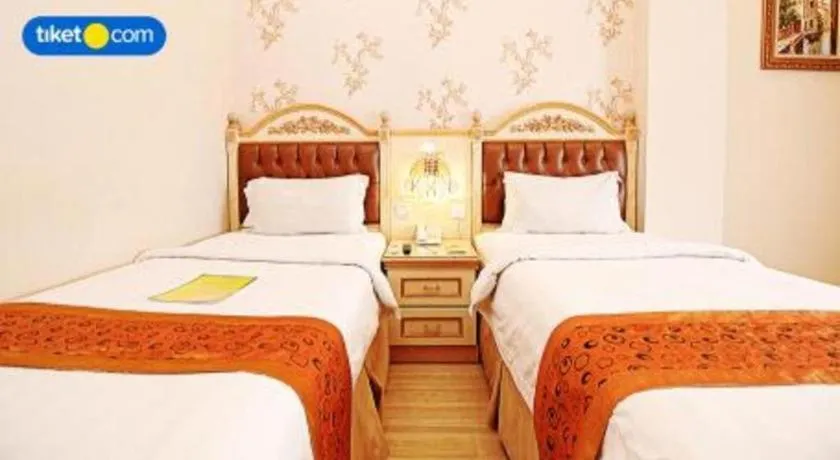 Bed in Hotel Grand Town