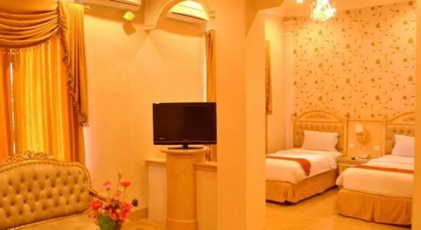 Bed in Hotel Grand Town