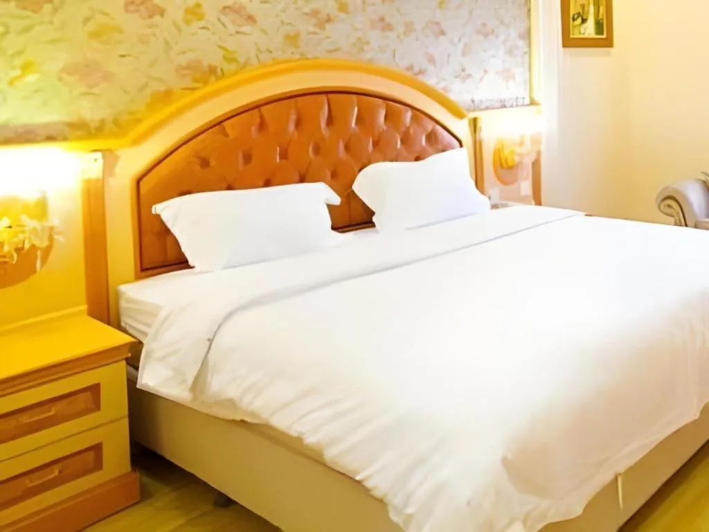 Bed in Hotel Grand Town