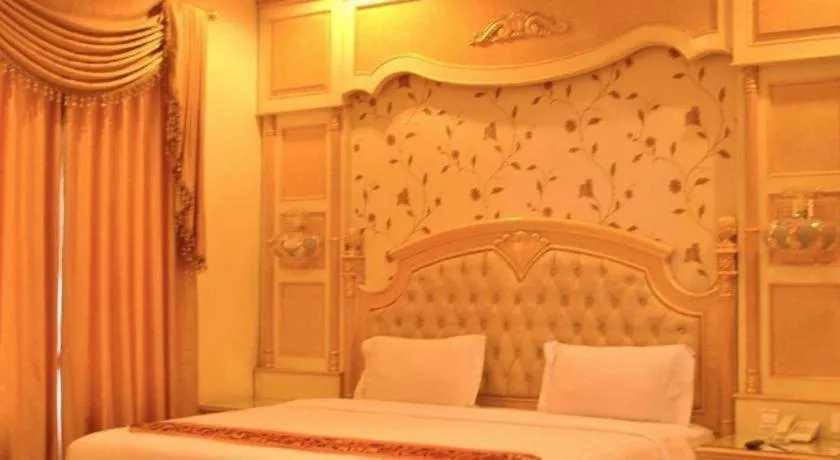 Bed in Hotel Grand Town